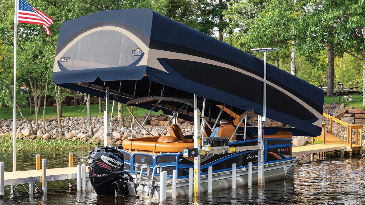 FLOE boat lift with pontoon on a lake